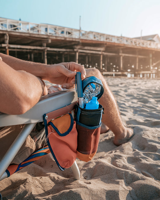 4AllFamily Companion Soft Cooler Bag for Insulin and Medicines - Blue Color - Picture of a man with diabetes taking an insulin pen out of the cooler